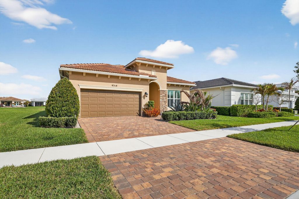 Photo of 9318 SW Miracoli Way, Port Saint Lucie, FL 34987 (MLS # B26034332)