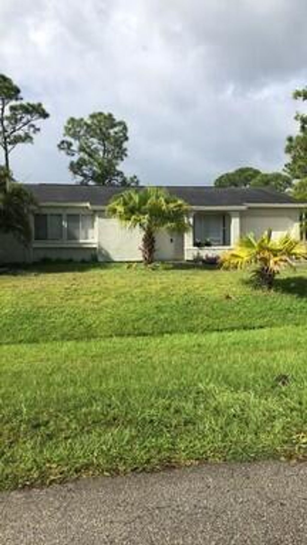 Photo of 1152 SE Odonnell Lane, Port Saint Lucie, FL 34983 (MLS # R10765717)