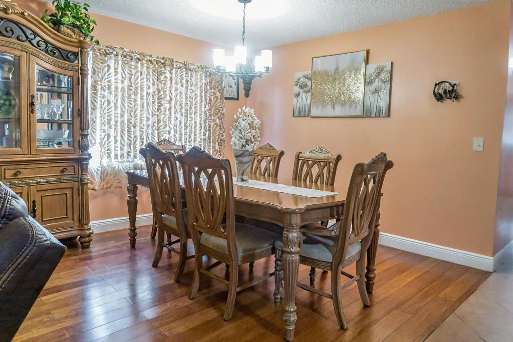 Photo of 7095 Pine Bluff Drive, Lake Worth, FL 33467 (MLS # R11094290)