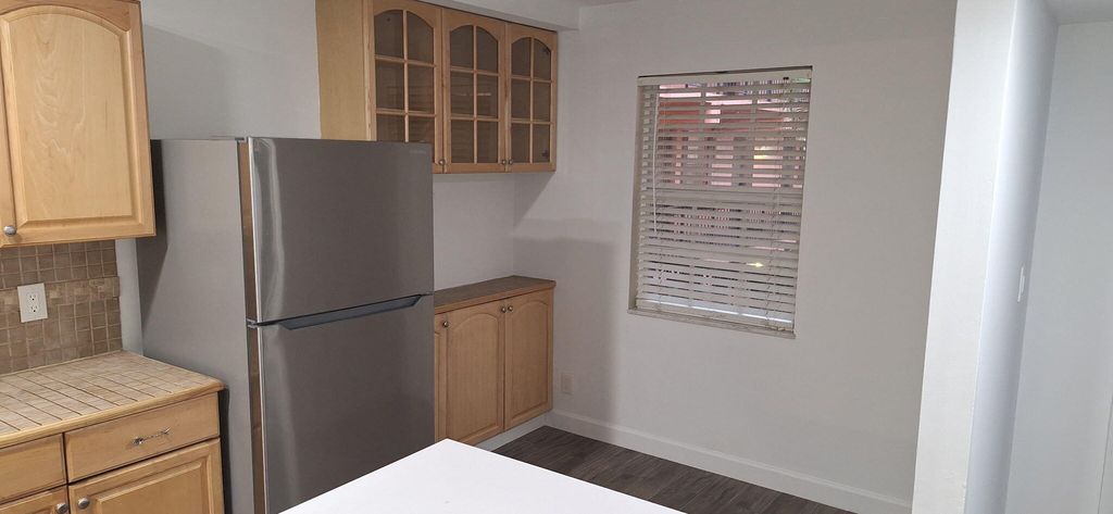 Photo of 640 Tennis Club Drive #307, Fort Lauderdale, FL 33311 (MLS # B26043984)