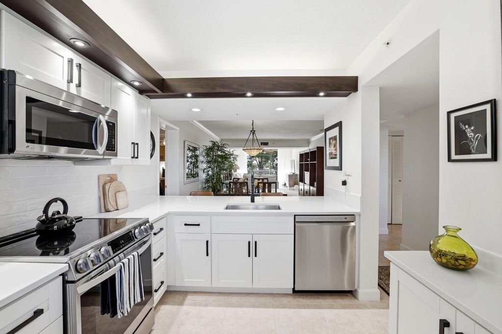 Photo of 2101 Marina Isle Way #404, Jupiter, FL 33477 (MLS # B26004159)