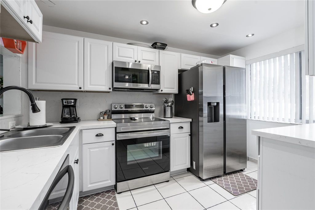 Photo of 3601 Inverrary Dr #107, Lauderhill, FL 33319 (MLS # F10530179)