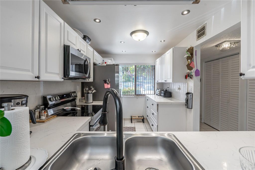 Photo of 3601 Inverrary Dr #107, Lauderhill, FL 33319 (MLS # F10530179)