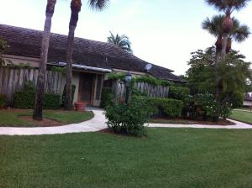 DESIRABLE PALM BEACH POLO - GATED COMMUNITY PERFECT LOCATION - END VILLA ON CORNER LOT UPDATED 2BDR/2BA SPACIOUS LIVING/DINING RM WITH BUILT IN BAR/SHELVING GREAT KITCHEN/SUB ZERO REF GREAT COUNTER TOPS AND TILED BACK SPLASH/COUNTER AREA WITH STOOLS PANTRY WITH SHELVING. LARGE MASTER BDR HAS WALK IN CLOSET WITH BUILT IN DRAWERS/SHELVING - MASTER BATH WITH DOUBLE SINKS/GRANITE COUNTERTOPS/SEP. MAKE UP DRESSING AREA. BEAUTIFUL ALL TILE SPA TUB/RAIN SHOWER - LARGE 2ND BDR + WALK IN CLOSET AND WONDERFUL BATH SHOWER/TUB-SEP CLOSET/WASHER/DRYER   RELAX ON THE PRIVATE FENCED POOL AND PATIO AREA-TURNKEY-FULLY FURNISHED    CLOSE TO WEF, ALL SHOPPING AND RESTURANTS  MUST SEE THIS WONDERFUL PROPERTY. (COFFEE TABLE IN LIVING ROOM, CRYSTAL AND PERSONAL ITEMS DO NOT CONVEY)