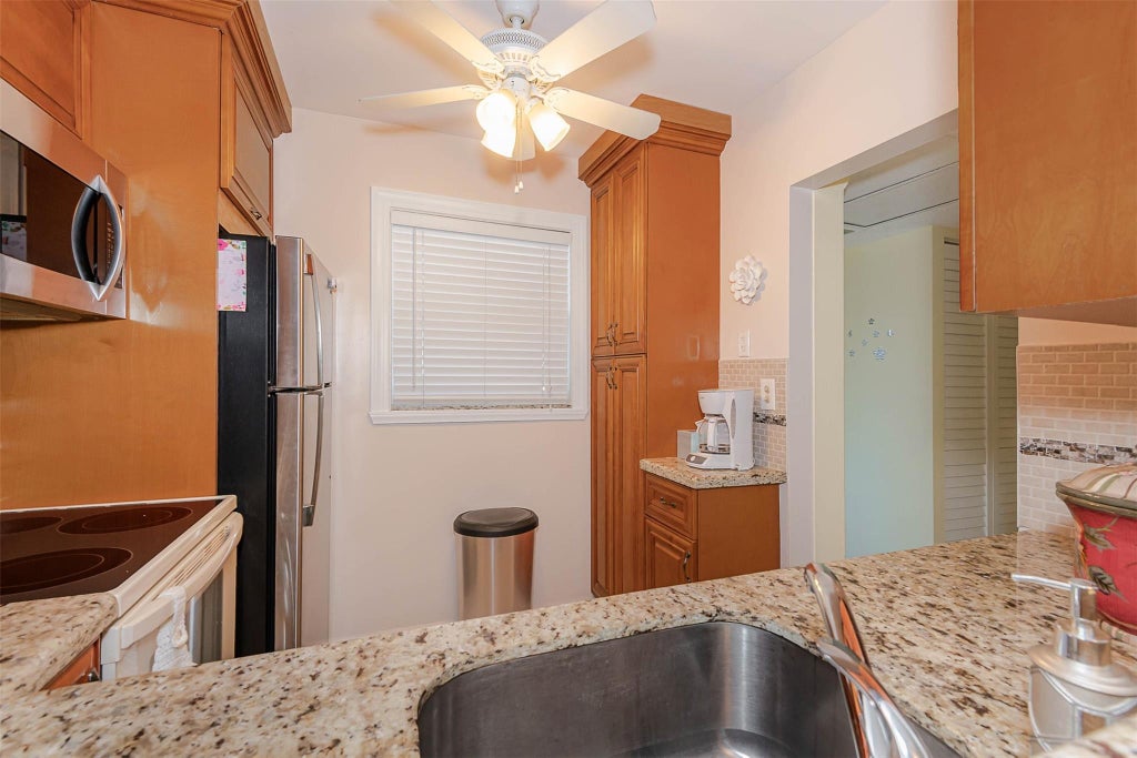Photo of 3431 NW 50th Avenue #104, Lauderdale Lakes, FL 33319 (MLS # B26038006)