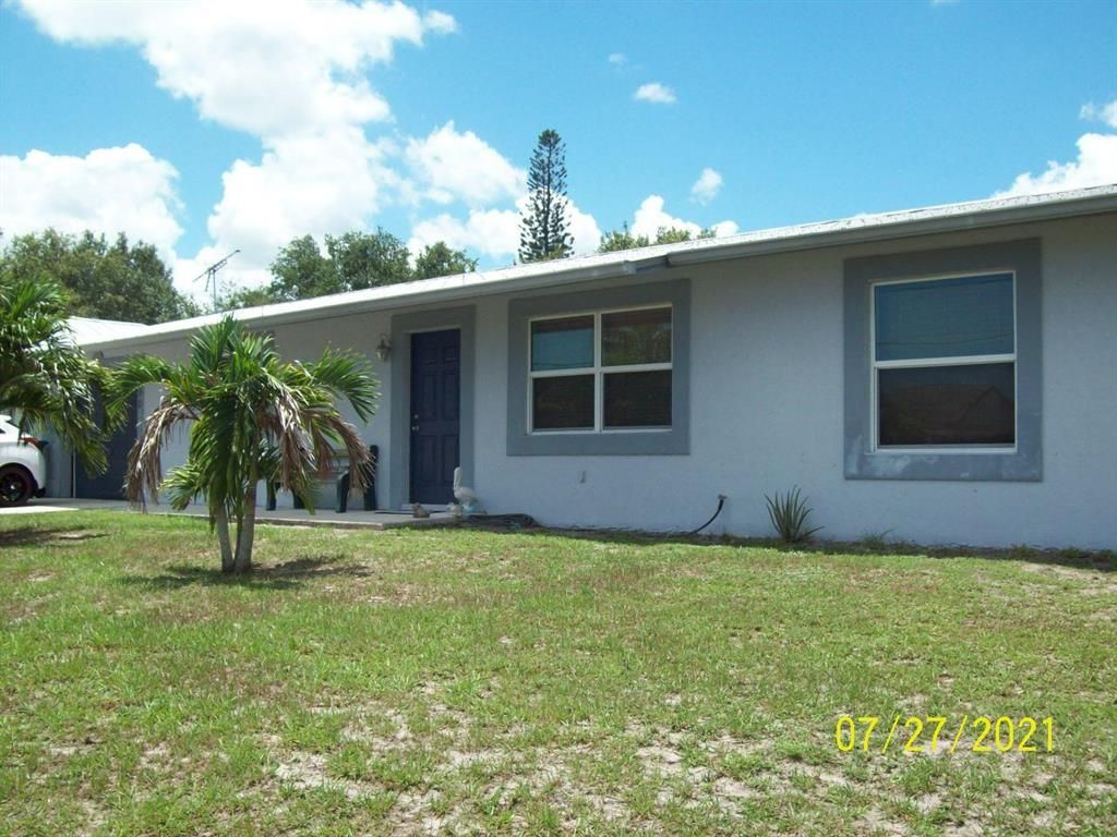 Photo of 2190 SE Sunflower Street, Port Saint Lucie, FL 34952 (MLS # R10734482)