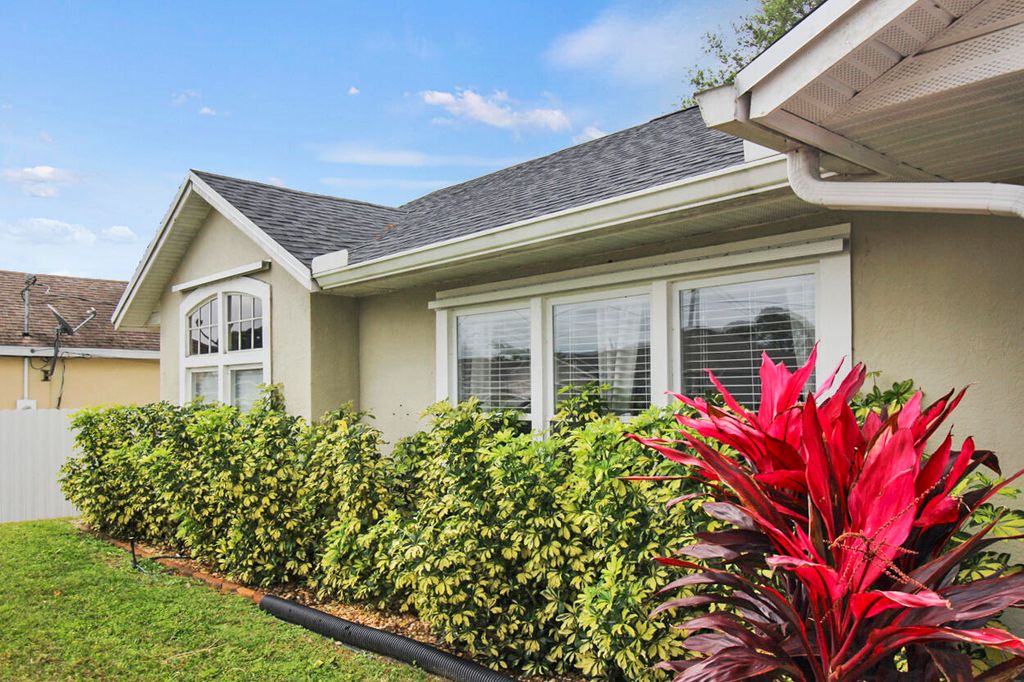 Photo of 990 SW Nichols Terrace, Port Saint Lucie, FL 34953 (MLS # R10963098)