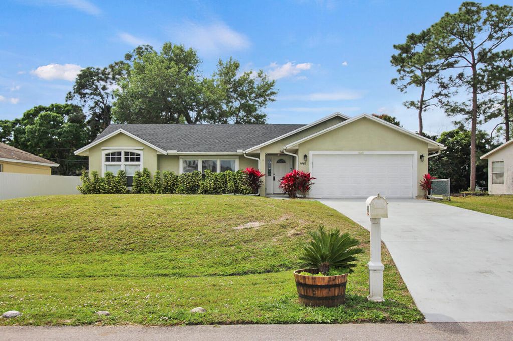 Photo of 990 SW Nichols Terrace, Port Saint Lucie, FL 34953 (MLS # R10963098)