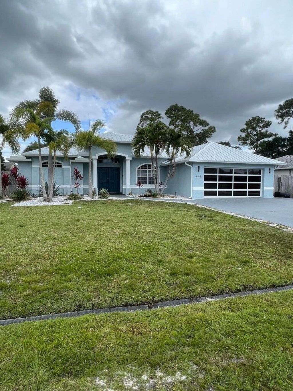 Photo of 886 SW Curtis Street, Port St Lucie, FL 34983 (MLS # R10908863)