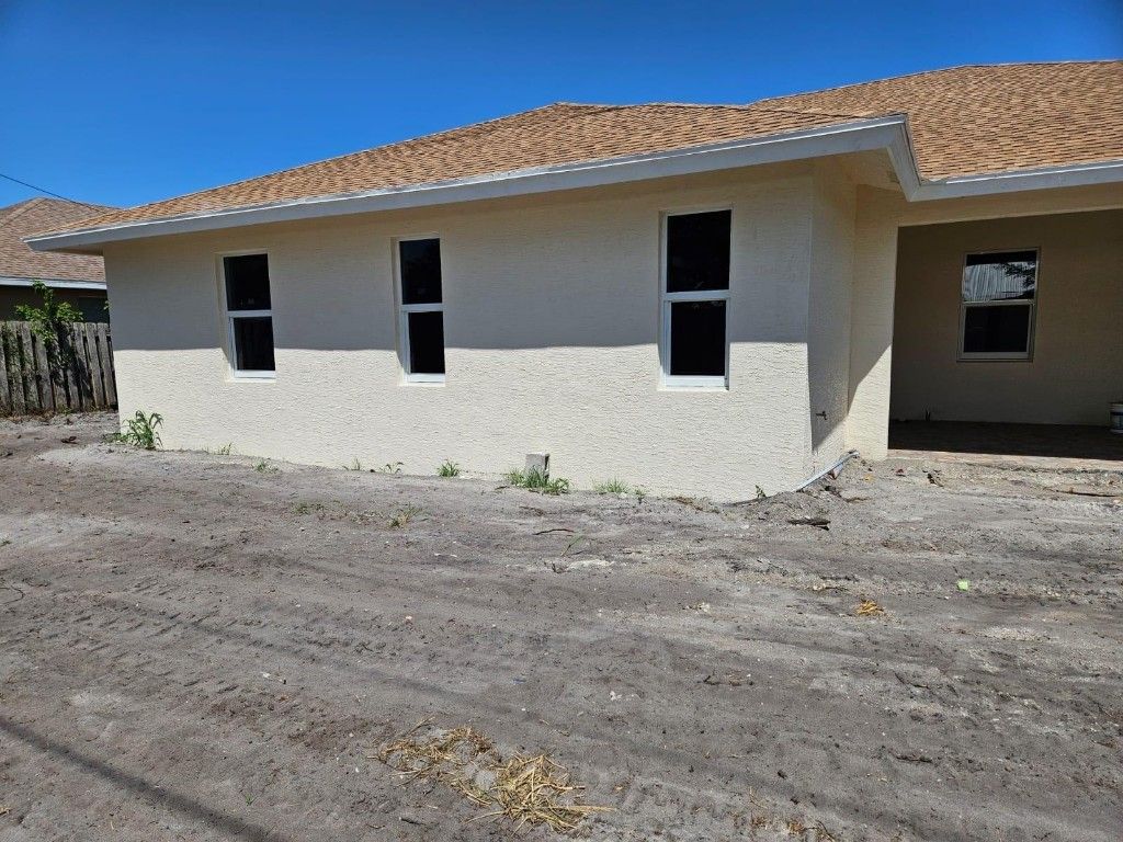 Photo of 1908 SW Americana Street, Port Saint Lucie, FL 34953 (MLS # F10499148)