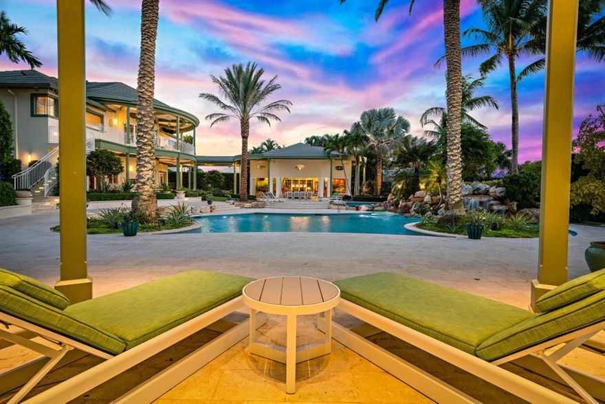 Welcome to 3131 Casseekey Island Drive, one of the most exquisite, private, and gated waterfront estates in all of Jupiter. This 5 structure estate is situated on 1.2 acres of land with 205' of direct water-frontage, ready for your yacht. Custom built with designer finishes throughout the 7 bedroom, 12.5 bathroom property features a luxurious main house, a guest house, a separate fitness center, dance studio, and spa, a spacious cabana / party house overlooking the pool and waterway, captains quarters, resort like pool & spa, meditation / zen garden, butterfly garden, boat lift, custom 205 foot dock with lift, three year old roof, a five and a half car garage, and so much more. This is luxury living at its finest.  Please click on the supplement for a full description of this property.