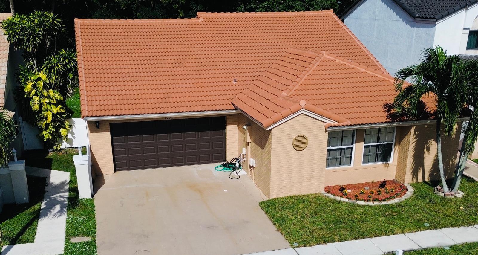 Welcome to this beautiful 3-bedroom, 2-bathroom single-family home, nestled in a charming community Boca Springs. New Roof (2020) and AC (2023) spacious modern design with volume ceilings and a desirable split-bedroom layout. Upgraded kitchen featuring quartz countertops, stainless steel appliances, and upgraded bathrooms with a two-car garage providing convenience and extra storage.Bright and inviting living spaces with very large screened patio with nice garden view, perfect for relaxation or entertaining.Low HOA fees covering common area maintenance, a large pool, playground, tennis courts, basketball and volleyball courts, and well-maintained sidewalks throughout the community.Don't miss the chance to own this wonderful home and become part of a welcoming and active community.