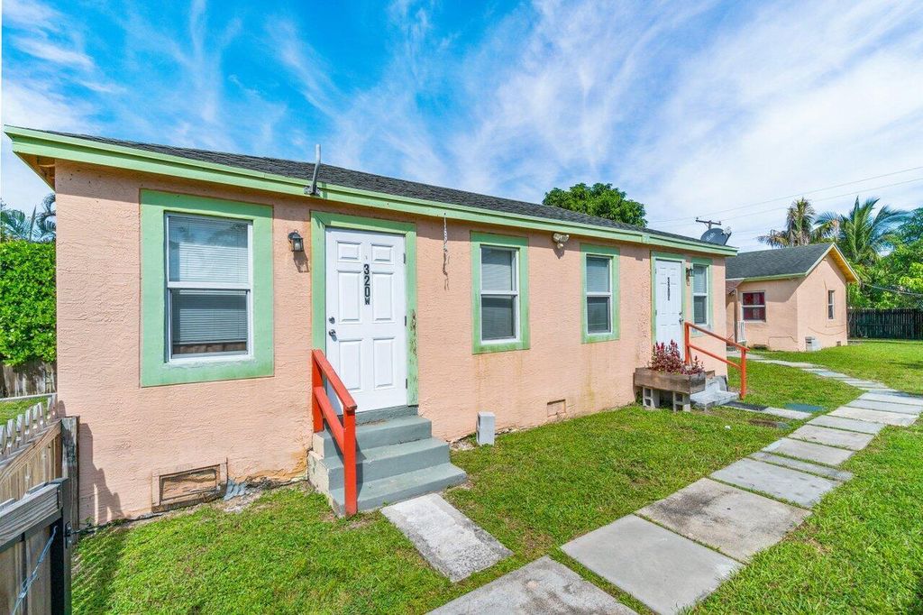 Photo of 320 Swain Boulevard, Greenacres, FL 33463 (MLS # B26017653)