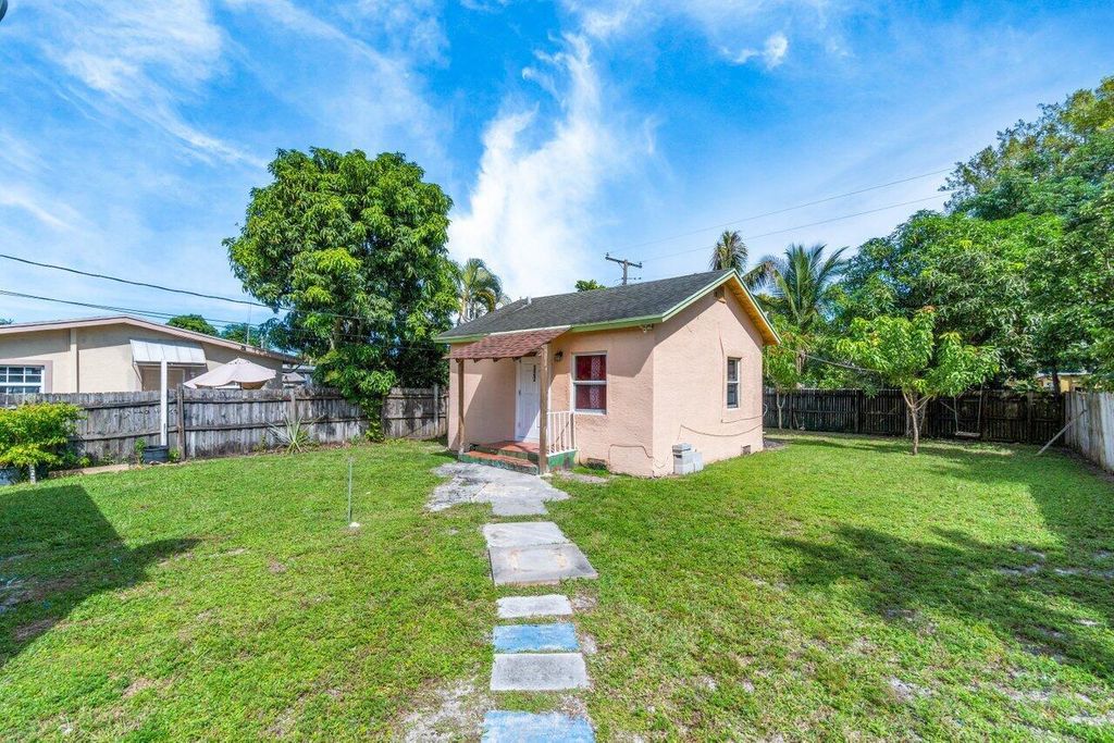 Photo of 320 Swain Boulevard, Greenacres, FL 33463 (MLS # B26017653)