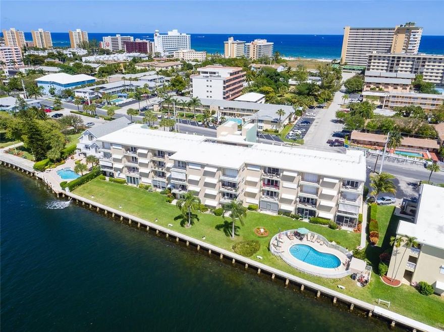 Looking for an Intracoastal front condo with captivating sunsets?  This stunning top floor condo offers a split bedroom plan and a very spacious interior. A comfortable kitchen with granite counters and a pass-thru into the dining area. Hurricane impact windows and doors throughout including sliders leading out to an open balcony boasting panoramic Intracoastal views and gorgeous sunsets . Watch a daily parade of yachts cruising by. Beach access is a few short blocks. Shopping and restaurants all nearby.