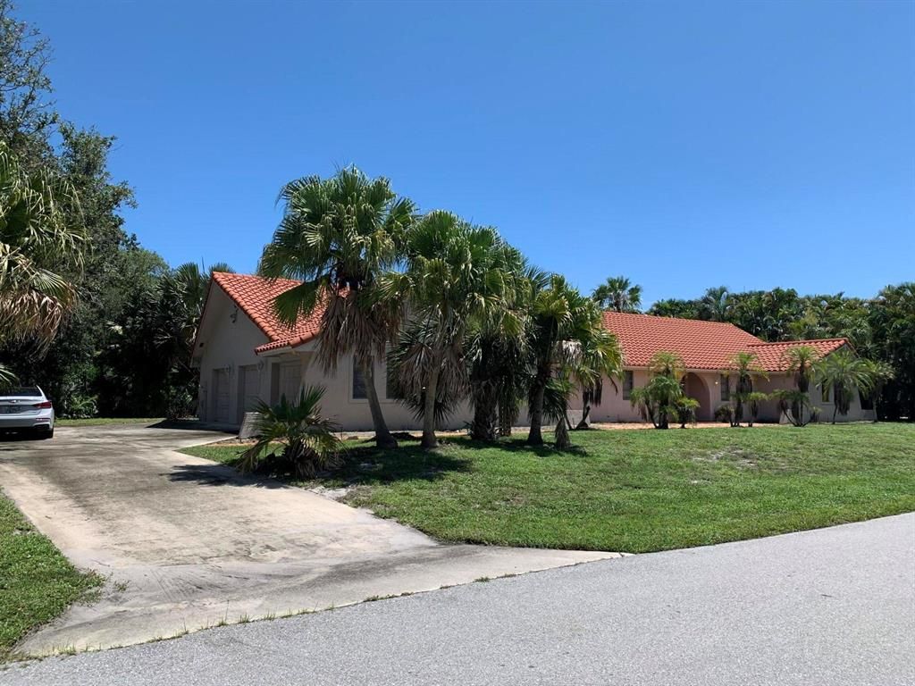 Photo of 15 SE Turtle Creek Drive, Tequesta, FL 33469 (MLS # R10736402)