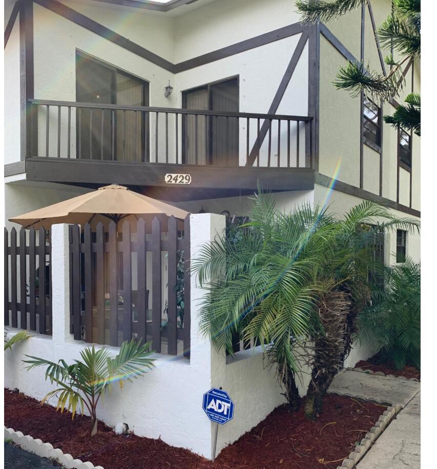🌿 Hidden Gem in a Private Gated Enclave!Discover charm and tranquility in this rarely available 2-bed, 2.5-bath townhome nestled on a quiet street within a gated community featuring a sparkling pool. Step into a spacious fenced courtyard--ideal for outdoor entertaining--and enjoy a newly updated kitchen.Upstairs, the master suite offers a Roman tub, oversized walk-in closet, and shares a scenic corner balcony with the second bedroom, which includes its own private bath. A powder room on the main level and a large under-stair storage closet add convenience and functionality.Recent upgrades include a 2024 roof. Hurricane panels included. Tile flooring in living areas, cozy carpet in bedrooms. Pet-friendly (2 pets up to 20 lbs). Assigned covered parking plus open and guest spaces.
