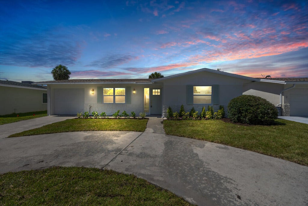 Photo of 400 Riverside Drive, Palm Beach Gardens, FL 33410 (MLS # R11100360)