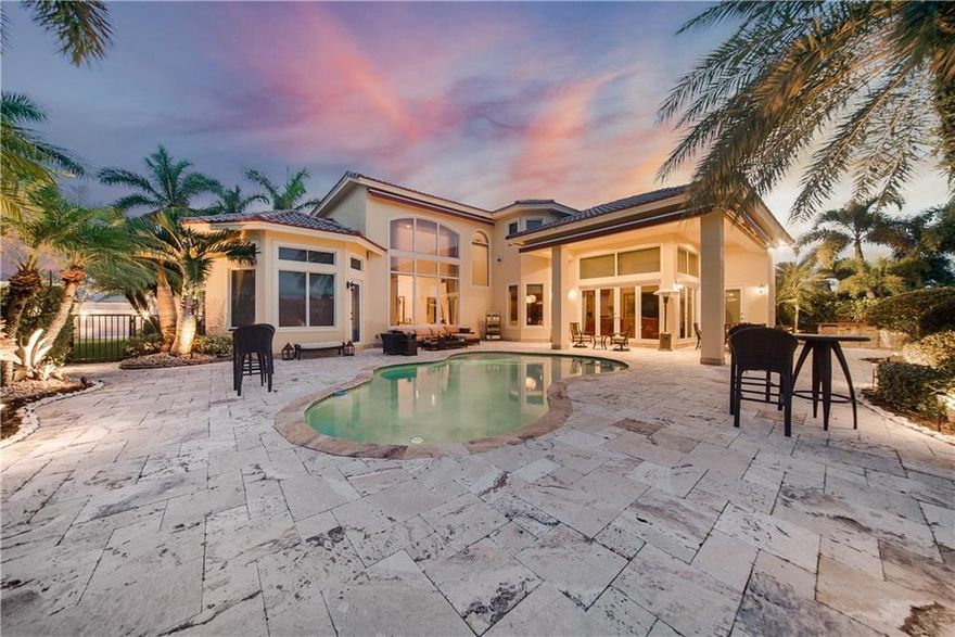 Rarely Available Upgraded Malvern Model 6 Full Beds, 6.5 Baths Waterfront Pool Home w/3-Car Garage, & Circular Driveway! All 6 Beds Have Their Own Private & On-Suite Baths! Impact Windows & Doors! Custom Finishes Throughout Including Real Cherry Wood Floors In Main Living Rooms & Beds, Downstairs Private Primary Bed w/Sitting Area, Walk-In Closet, Marble Floors In Kitchen & Family Room, Chef Kitchen w/Updated High-End Stainless Steel Appliances, Island w/On-Suite Baths, Extended Travertine Pavered Patio Area w/Built-In Summer Kitchen, Retractable Awning, Pool/Patio Area Perfect For Entertaining & Gorgeous Views Of Lake, High-End Light Fixtures & Window Treatments, Dramatic Wrought Iron & Marble Staircase, Resort Style Amenities Including 2 Clubhouses, 24-Hour Guard Gated, A-Rated Schools!