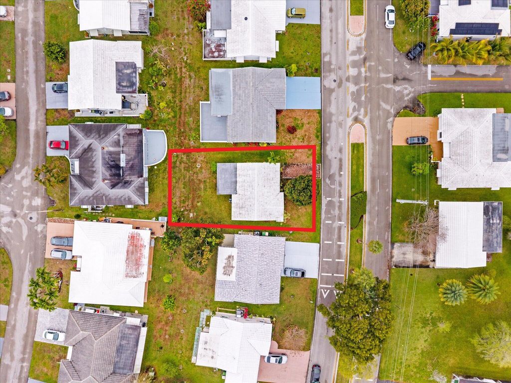 Photo of 5713 NW 84th Terrace, Tamarac, FL 33321 (MLS # B26009503)