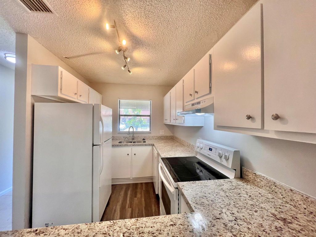 Photo of 480 Glenwood Drive, West Palm Beach, FL 33415 (MLS # R10917837)
