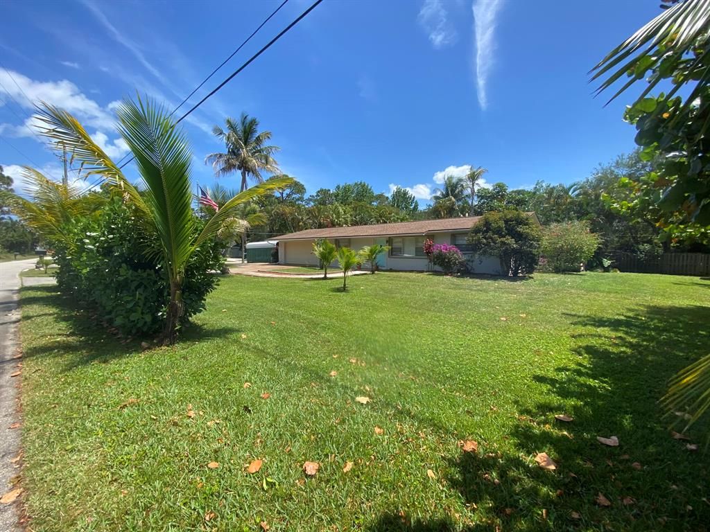 Photo of 8842 SE Duncan Street, Hobe Sound, FL 33455 (MLS # R10707690)