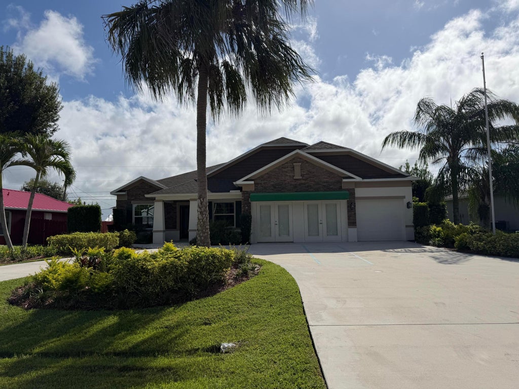 Photo of 2849 SW Savona Boulevard, Port Saint Lucie, FL 34953 (MLS # B26080966)