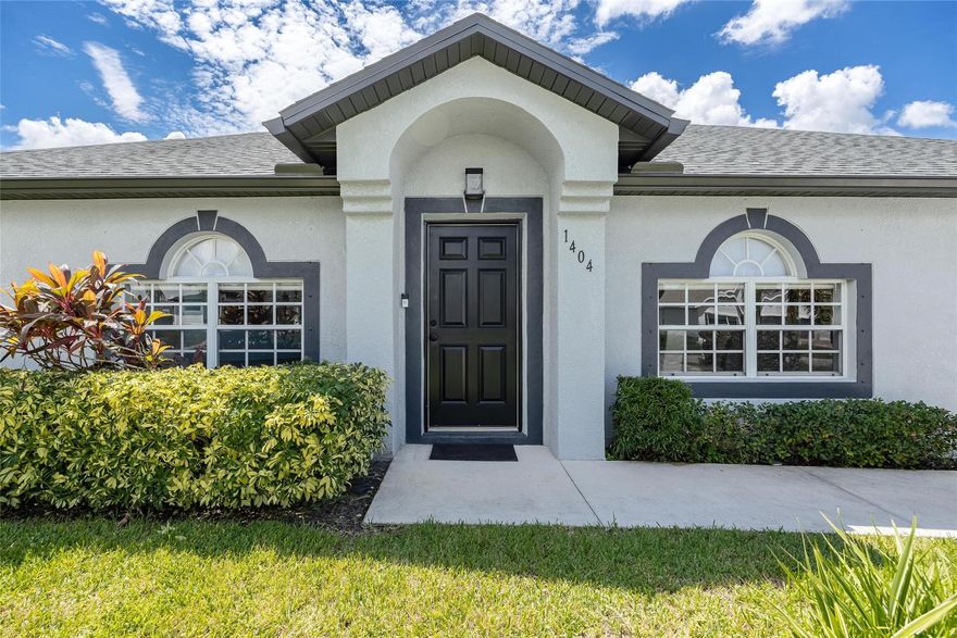 Rare find! This huge 3-bedroom plus den/office home in NW Cape features fully paid city water and sewer assessments- a $30,000+ savings! Located in one of Cape Coral's up and coming neighborhoods with an assumable loan option available at just 5.1% interest for qualified buyers. Home is in a NO FLOOD ZONE and offers a rare blend of comfort and financial advantage. Featuring 2,236 sqft of living space with recent enhancements that includes brand-new roof installed in 2023, interior and exterior paint, vinyl privacy fence, and an energy-efficient a/c with a Nest thermostat. With valuable perks: city water and sewer assessments fully paid, no flood zone, in a low-risk Evacuation Zone C, and no HOA fees...its move in ready!  Located near hospitals, popular dining, shopping, and entertainment.