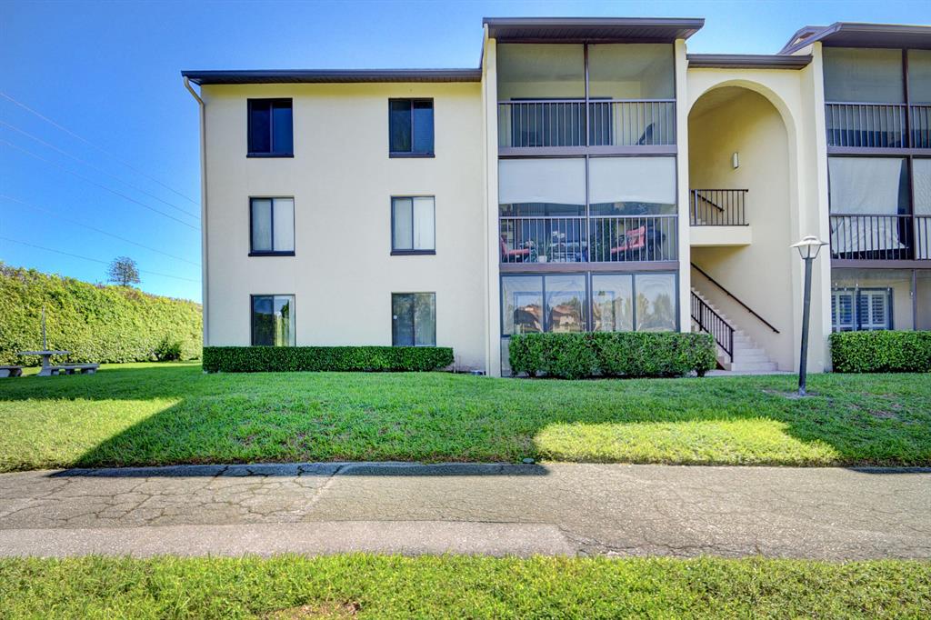 Great opportunity to live in the desirable, pet friendly community of Pine Ridge II. Convenient fisrt Floor, 2 bedroom 2 bath has a spacious living room area, with updated kitchen and bathrooms. Unit also includes an exterior storage closet. Beautiful lake views from back lanai. Centrally located and close to the Wellington Mall, restaurants and much more. Easy access to I95 and Turnpike. All ages community with tennis court, pool, community room, walking paths. Condo cannot be leased the first year.