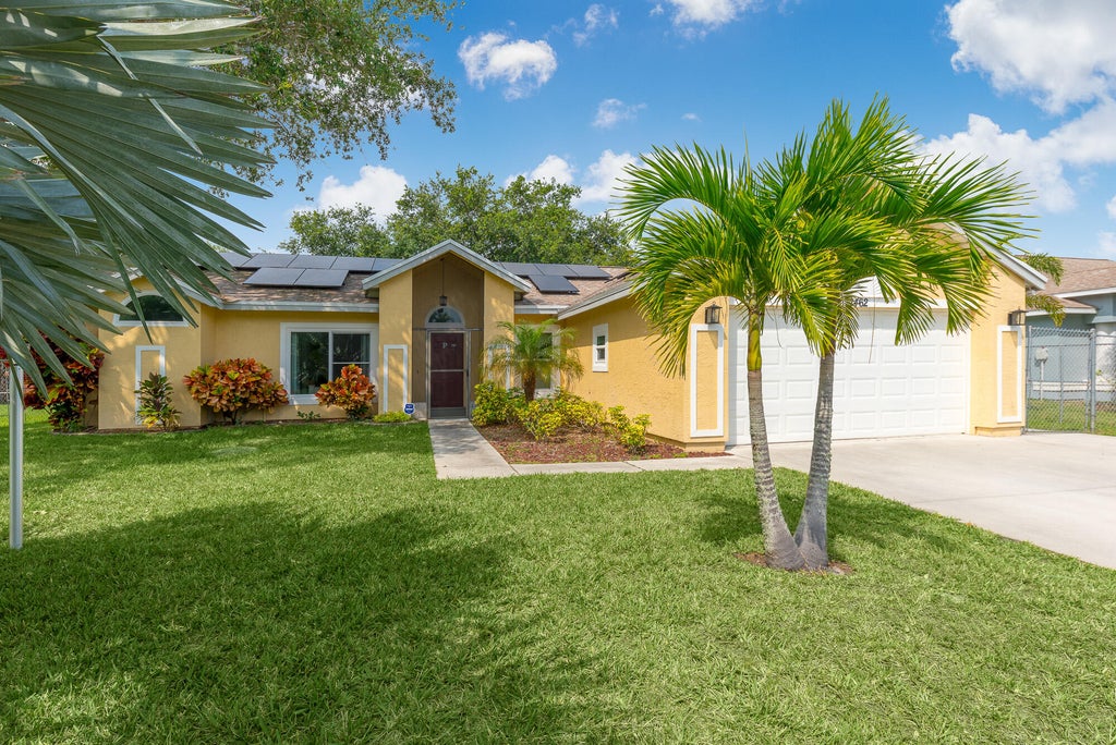 Photo of 2462 SE Richmond Street, Port Saint Lucie, FL 34952 (MLS # R10974513)