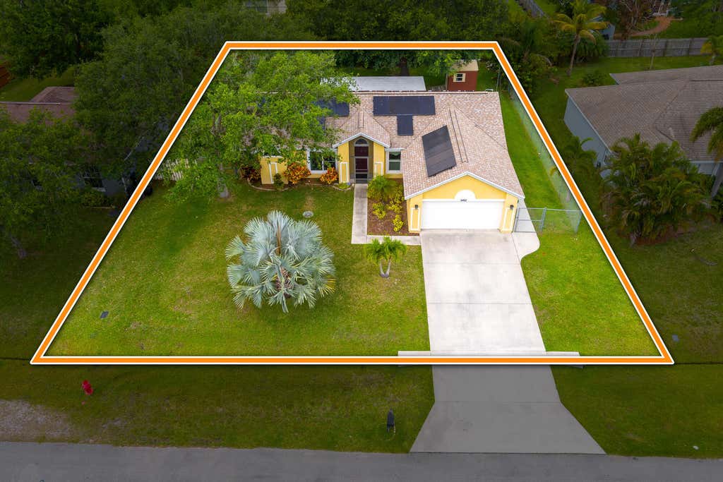 Photo of 2462 SE Richmond Street, Port Saint Lucie, FL 34952 (MLS # R10974513)