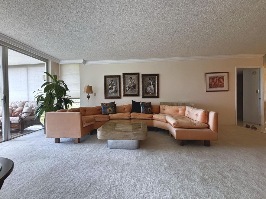 Spacious and impeccably maintained 3BR/2.5BA condo on the 5th floor at the Oaks at Palm-Aire — offered turnkey furnished with curated vintage and classic pieces (furniture optional). This expansive, light-filled unit features two separate living areas, a formal dining room with mirrored accents, granite kitchen with stainless appliances, and a screened balcony with serene golf course and treetop views. The generous primary suite offers a king bed, wall of mirrored closets, and en-suite bath. Pride of ownership shines throughout — every surface meticulously cared for and move-in ready. Enjoy resort-style Palm-Aire amenities and unbeatable access to I-95, the Turnpike, Pompano Beach, dining, and shopping. All ages welcome. A rare opportunity to own a turnkey retreat in one of South Florida's
