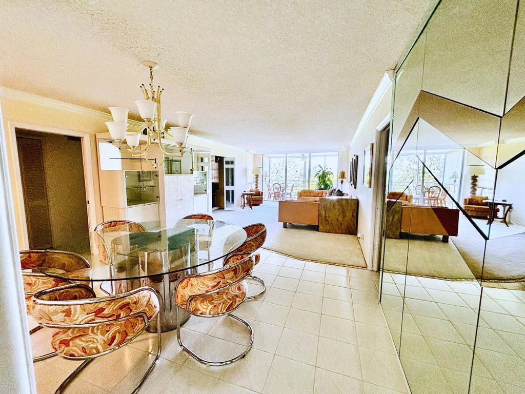 Photo of 3930 Oaks Clubhouse Drive #506, Pompano Beach, FL 33069 (MLS # B26032238)
