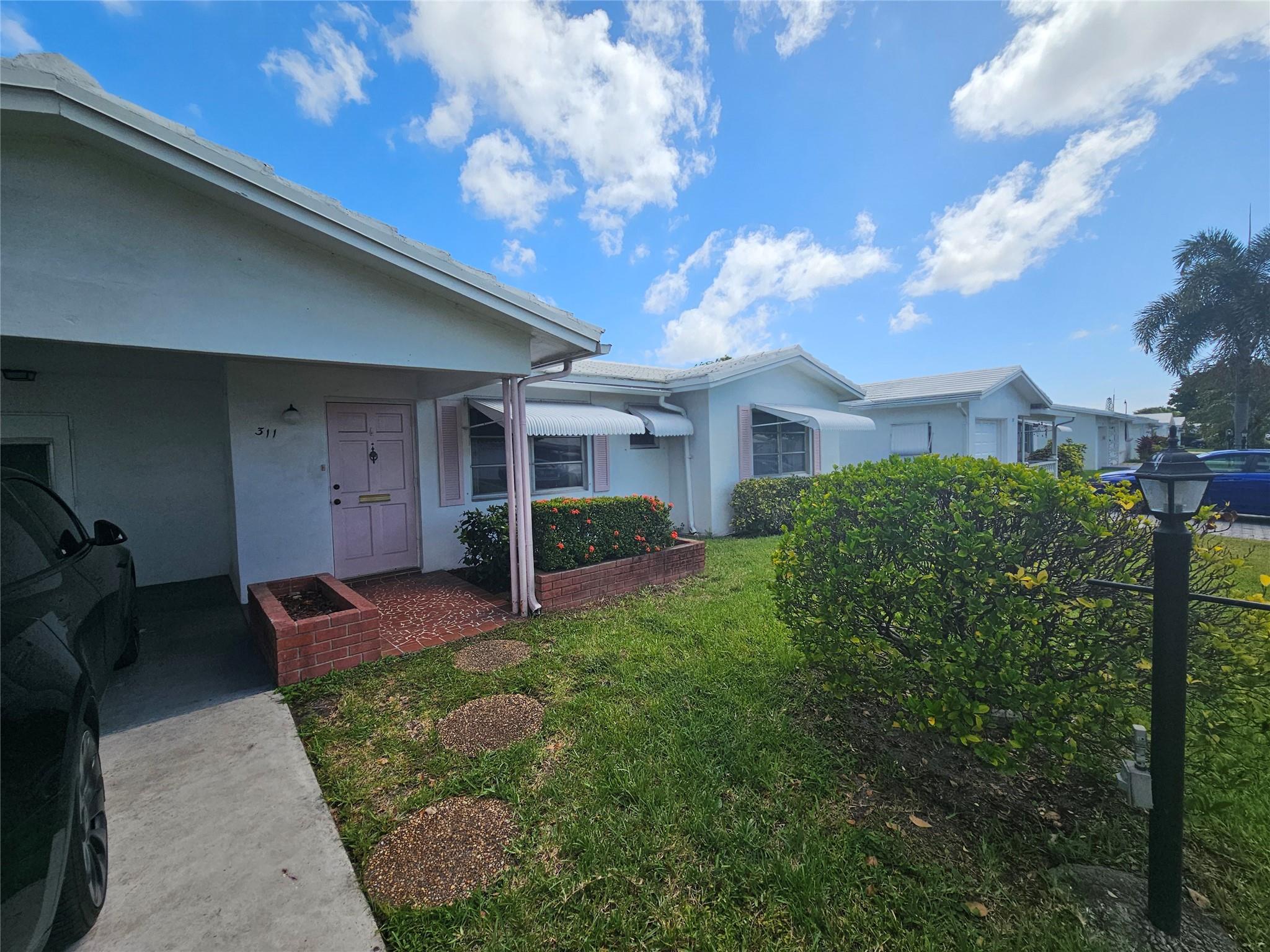 311 NW 25th Ct