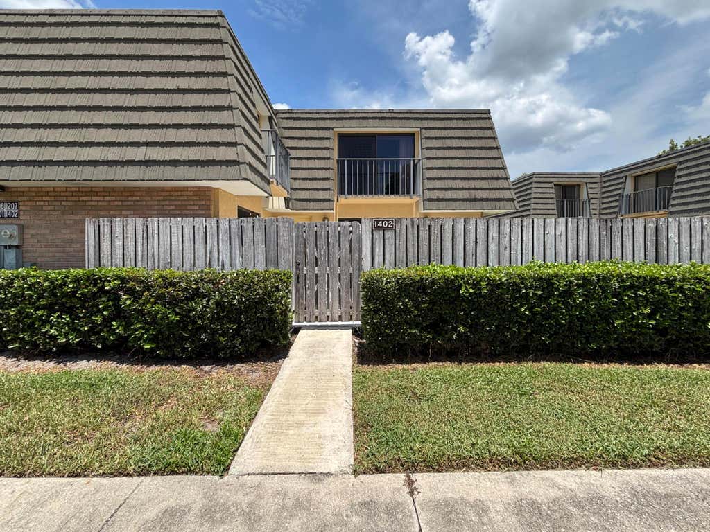 Photo of 1402 14th Way, West Palm Beach, FL 33407 (MLS # B26058229)