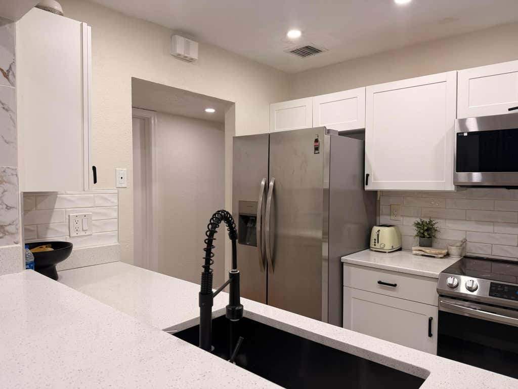 Photo of 5130 Elmhurst Road #A, West Palm Beach, FL 33417 (MLS # R11150721)