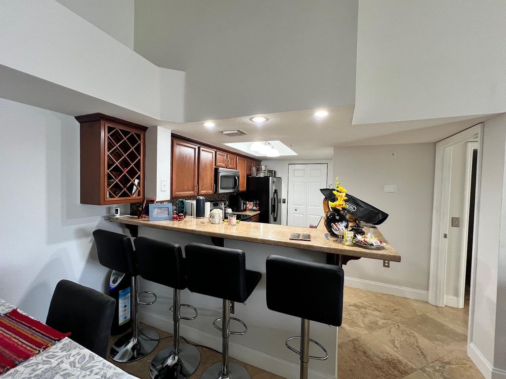 Photo of 5051 Wiles Road #306, Coconut Creek, FL 33073 (MLS # F10478575)