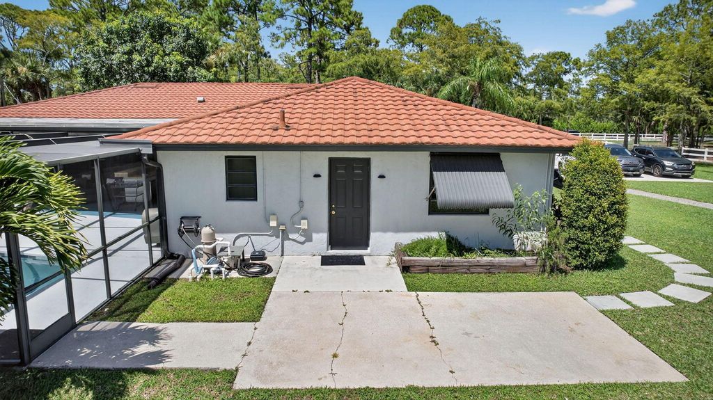 Photo of 17218 Shetland Lane #Apartment, Loxahatchee, FL 33470 (MLS # R11120075)