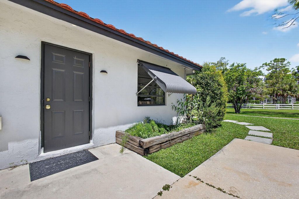 Photo of 17218 Shetland Lane #Apartment, Loxahatchee, FL 33470 (MLS # R11120075)