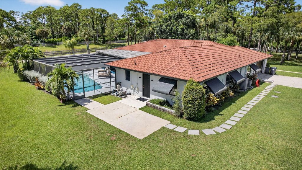 Photo of 17218 Shetland Lane #Apartment, Loxahatchee, FL 33470 (MLS # R11120075)