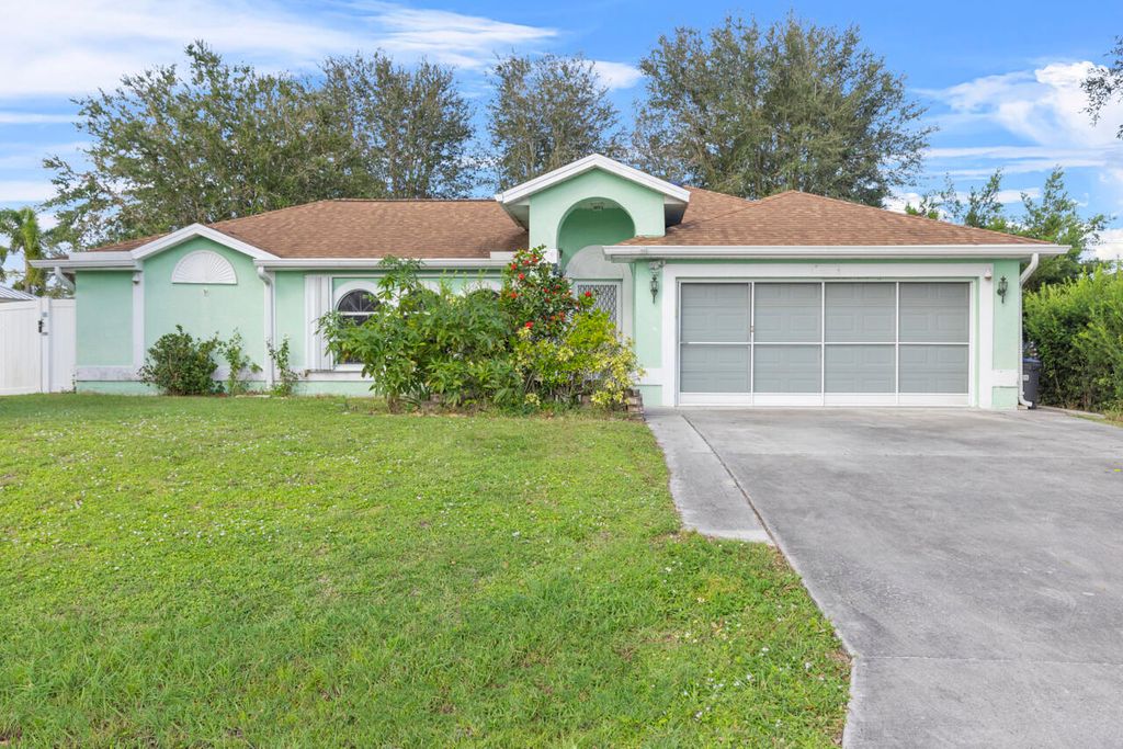 Photo of 671 SW Stillman Avenue, Port Saint Lucie, FL 34953 (MLS # R11032129)