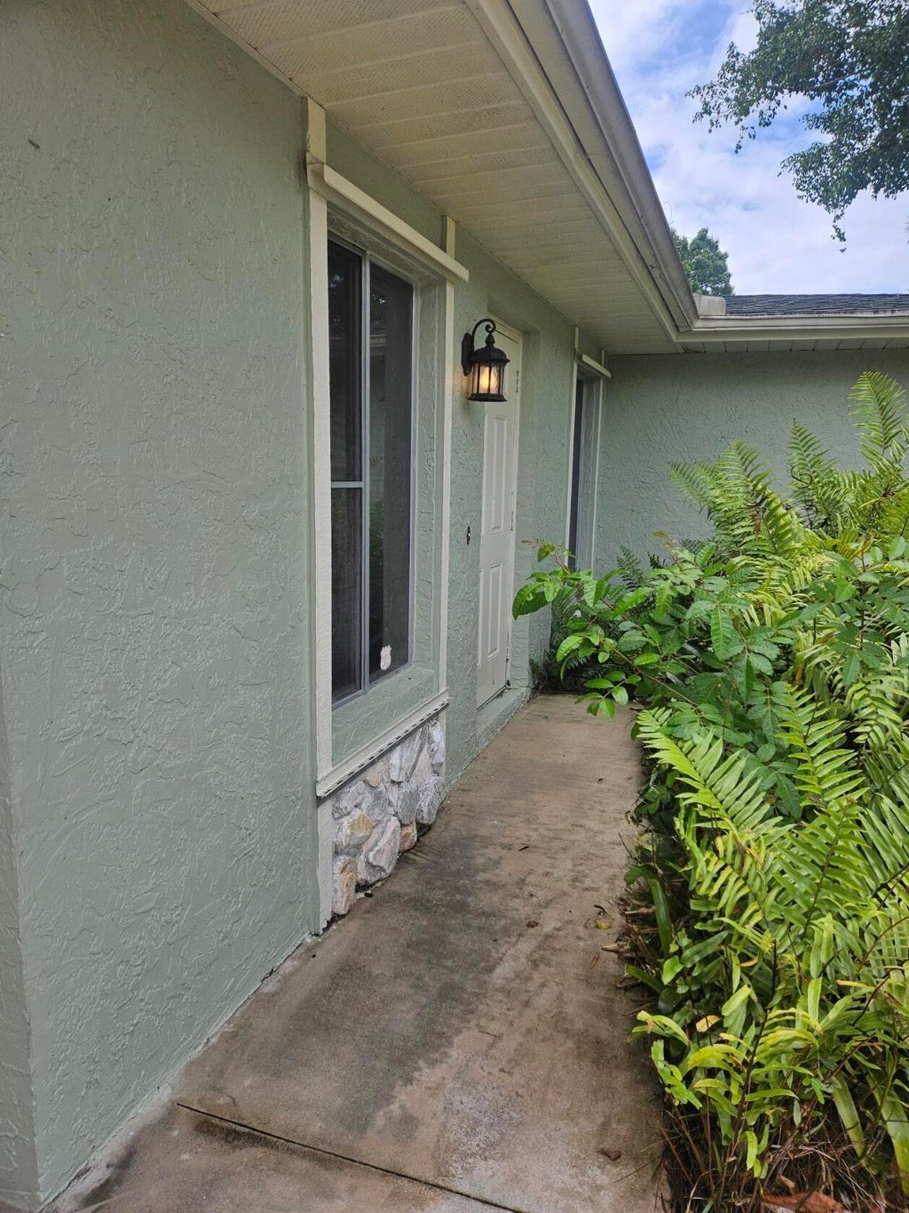 Photo of 5706 SE Sunset Boulevard, Fort Pierce, FL 34982 (MLS # R10981330)