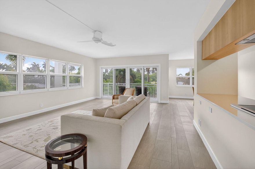 Welcome to this beautifully remodeled 2 bedroom, 2 bathroom condo, perfectly positioned just one block from vibrant Atlantic Avenue and a short walk to the beach. This residence has been completely renovated and features elegant tile flooring throughout and beautifully updated bathrooms. Enjoy peace of mind with impact hurricane windows and brand-new hurricane doors, while taking in the lush green landscaping that creates a private and serene setting. Additional upgrades include a new Bosch air conditioning system, Bosch hot water heater, and a closed-loop AC unit, providing efficiency and comfort year-round. The condo also offers the convenience of a full-size washer and dryer.Located in Delray Summit, residents enjoy resort-style amenities including a heated pool, fitness center,  club rooms, and on-site management. Experience the very best of Delray Beach living with dining, shopping, and the ocean just moments away.   Building exterior has been renovated and all assessments have been paid.