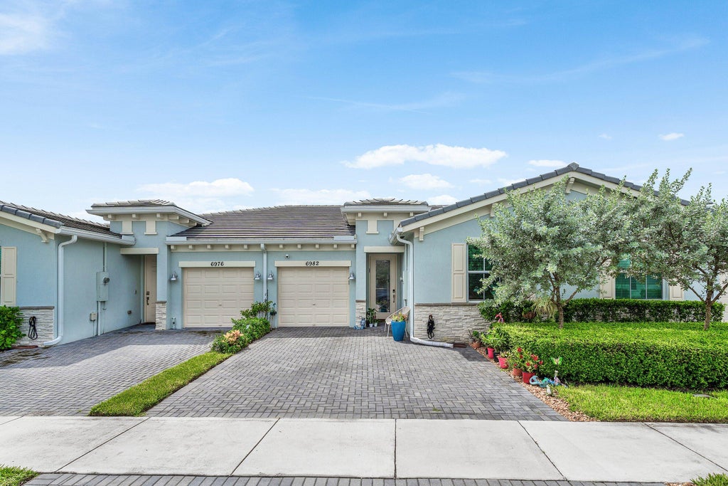 Photo of 6982 Peters Lane, Delray Beach, FL 33446 (MLS # B26079772)