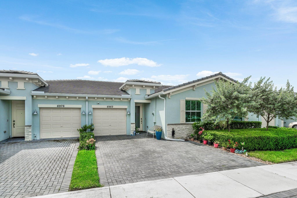 Photo of 6982 Peters Lane, Delray Beach, FL 33446 (MLS # B26079772)