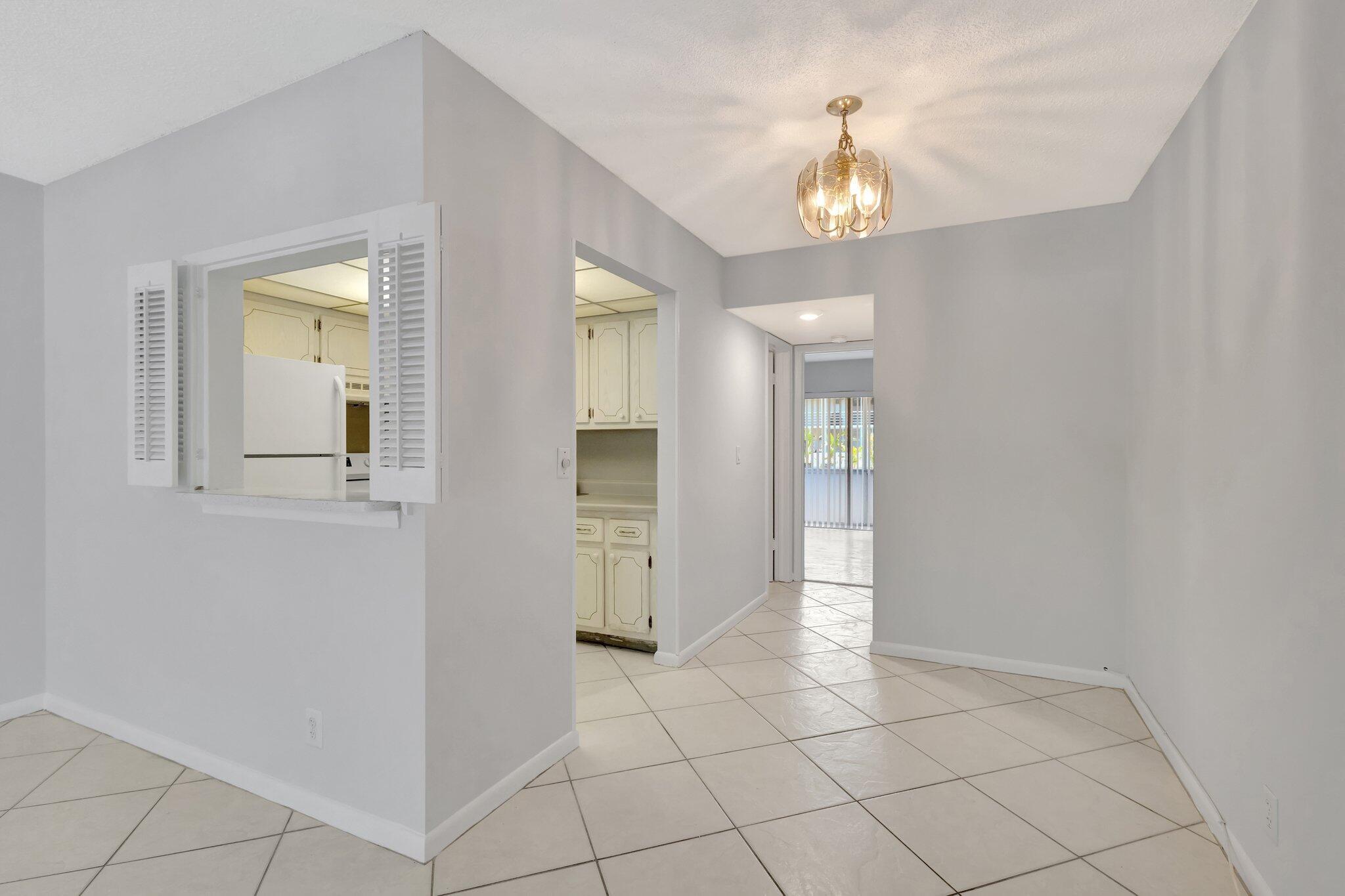 Location, Location, Location. Welcome to this charming 1 Bedroom, 1 Bathroom ground floor condo in the most private & peaceful location in this Gated Community. Freshly painted with high-quality Sherwin Williams paint throughout. Enjoy the convenience of tile flooring, new air conditioning and water heater, a walk-in shower, new window treatments, new flat top range. Residents have access to resort-style amenities, including a huge Clubhouse,18 pools, bus service, and a short walk to a nearby place of worship & a short walk to the gym. Live the lifestyle you deserve in this lovely condo. Not many ground floor units available. Book your showing now.