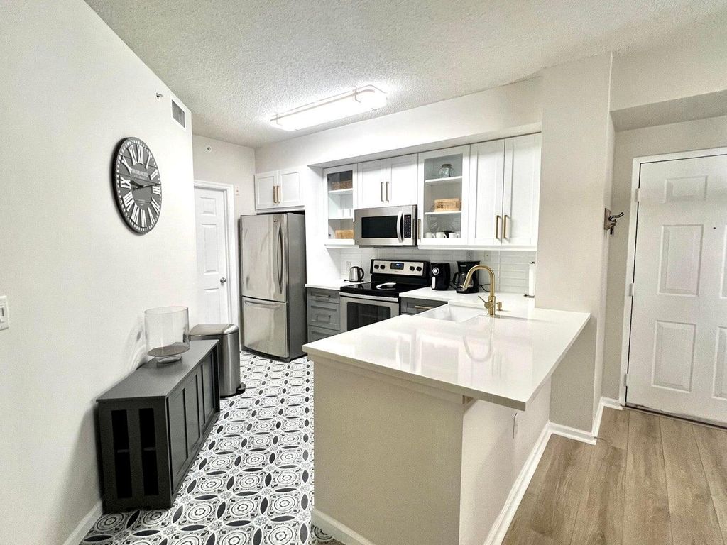 Photo of 11790 Saint Andrews Place #203, Wellington, FL 33414 (MLS # R11135620)