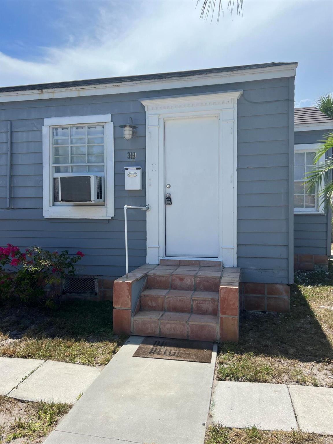 Lovely 1 bed 1 bath recently remodeled close too 700 sq. ft. Property is within walking distance historic downtown Lake Worth/Lake Ave offering plenty of shopping & restaurants. recently remodeled bathroom, hot water heater and amazing kitchen with Calcutta Quartz and SS appliances. rent includes water and sewer. Washer and dryer is included in unit . Large yard fenced yard