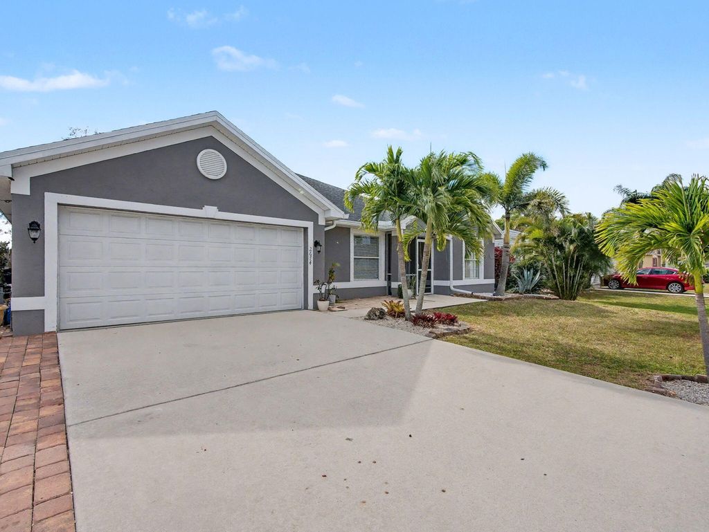Photo of 2674 SE Melaleuca Boulevard, Port Saint Lucie, FL 34952 (MLS # R11151413)