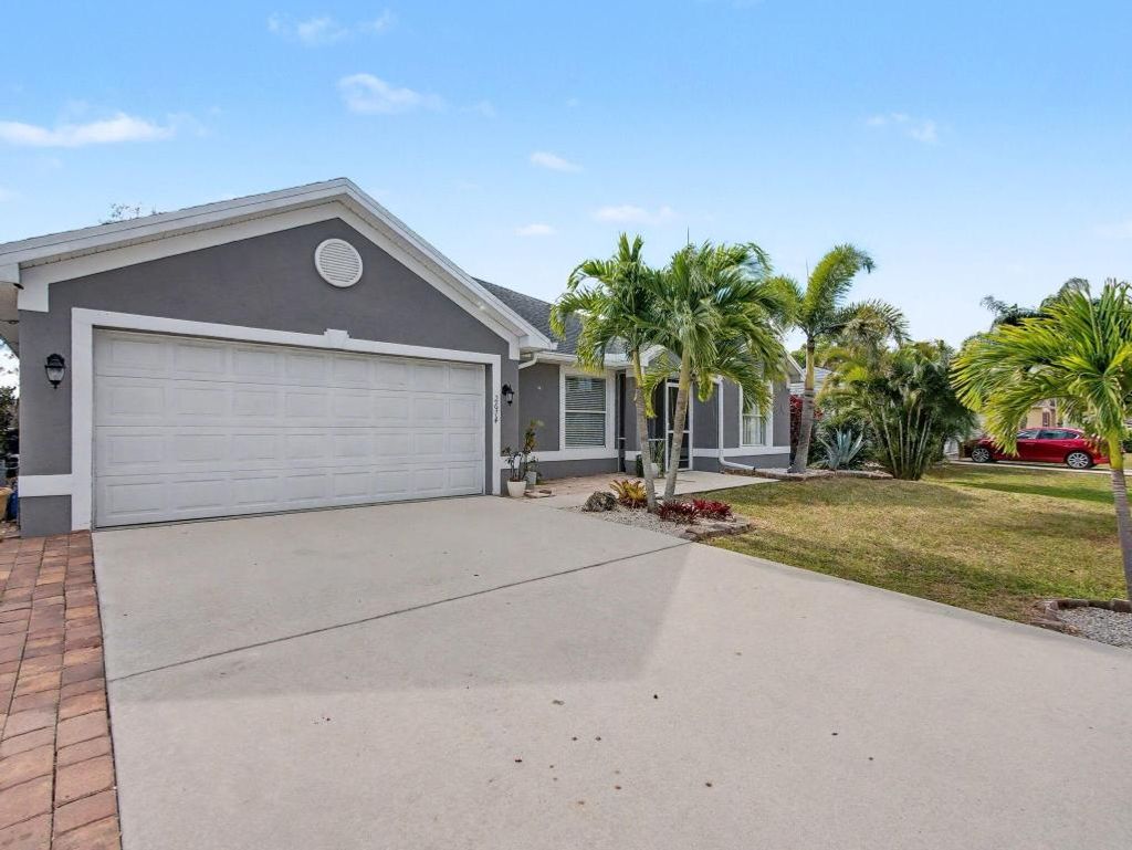 Photo of 2674 SE Melaleuca Boulevard, Port Saint Lucie, FL 34952 (MLS # R11151413)